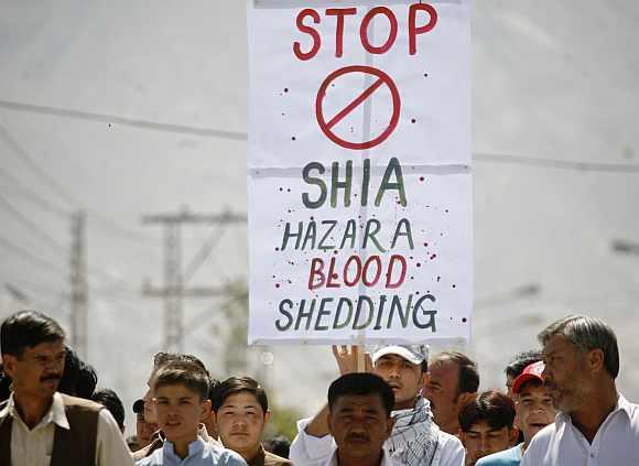 embers of the Shi'ite Hazara community march through the streets during a protest against the killing of ethnic minorities in Quetta