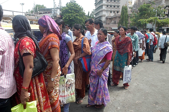 Commuters line up at Kurla bus stand