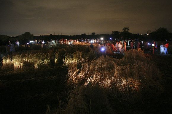 The field where the Boeing 737 airliner crashed is seen at night