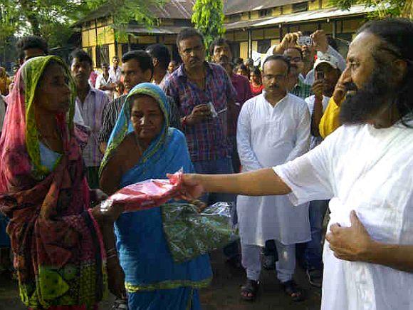 Sri Sri Ravi Shankar at the Basugaon Higher Secondary School relief camp in Assam