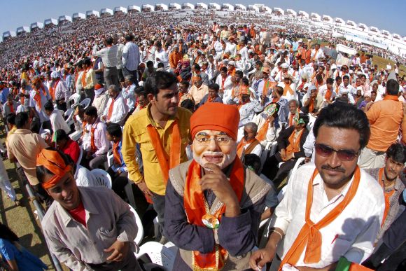 A supporter of the BJP at the swearing in ceremony of Gujarat Chief Minister Narendra Modi