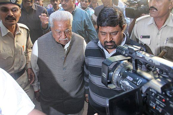 Keshubhai arrives to cast his vote in Rajkot