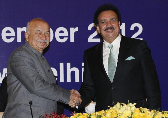 Indian Home Minister Sushil Kumar Shinde with Pakistan's Interior Minister Rehman Malik before their bilateral meeting in New Delhi.