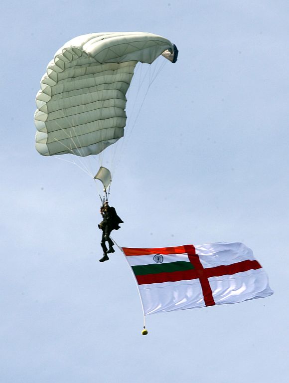 A marine commando carrying Indian Naval flag, during the Naval Exercise TROPEX-2012