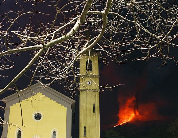 Mount Etna spews lava on the southern Italian island of Sicily