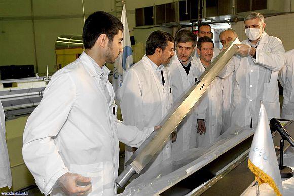 Iran's President Mahmoud Ahmadinejad (2nd L) attends the unveiling ceremony of new nuclear projects in Tehran