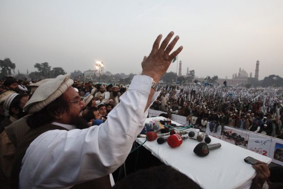 Hafiz Saeed speaks to gathering during an anti-American and Indian rally on the grounds of the Minar-e-Pakistan in Lahore
