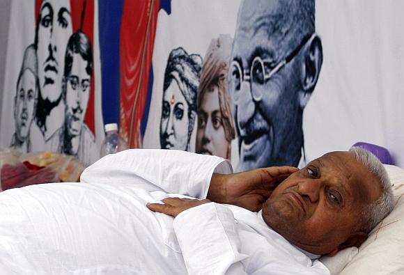 Anna Hazare rests during his fast unto death campaign in New Delhi on April 6, 2011.