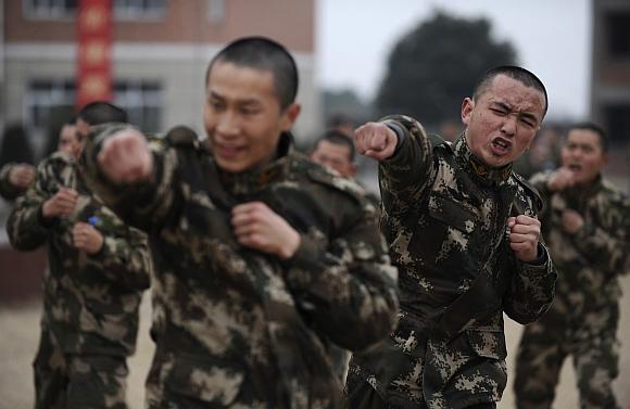 People's Liberation Army troops attend a training session in Jiaxing, Zhejiang province