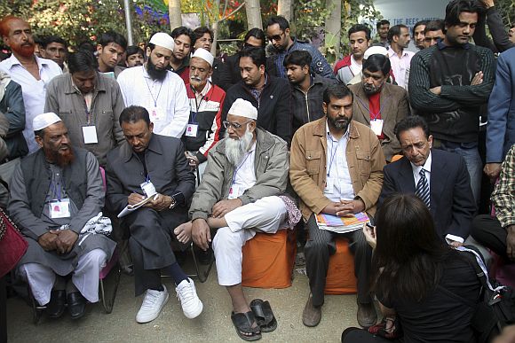 Members of various Muslim organisations sit before a televised speech by Salman Rushdie which was cancelled at the annual Literature Festival in Jaipur.