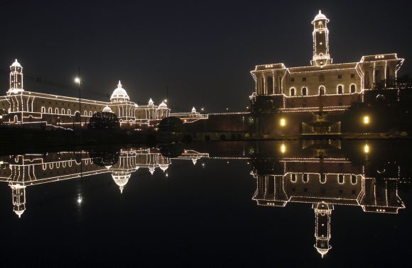 The Indian Defence Ministry (L) and Home Ministry buildings are illuminated during the Beating the Retreat ceremony in New Delhi