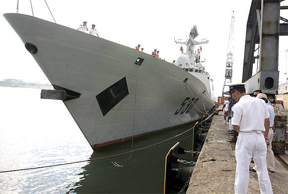 Chinese People's Liberation Army Navy's guided missile frigate FFG Zhoushan docks at a port