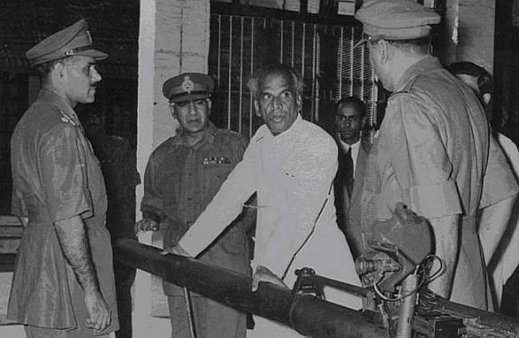 V K Krishna Menon, then India's defence minister who was blamed for India's ill preparedness during the 1962 War, meets with senior army officers