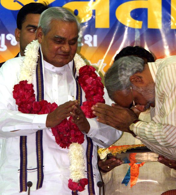 Narendra Modi, right, pays tribute to Atal Bihari Vajpayee.