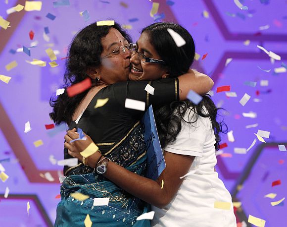 Snigdha celebrates with her mother after winning the Scripps National Spelling Bee