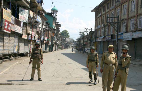 Security personnel keep a close watch