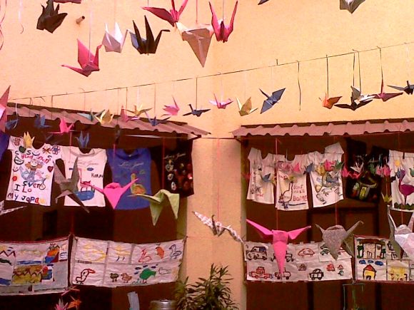 Origami cranes, T-shirts displayed as a part of the 1000 Crane Project