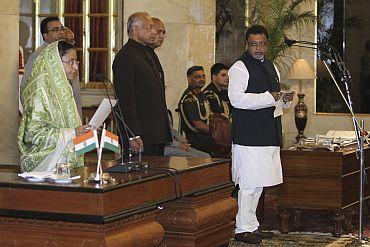 President Pratibha Patil administers the oath to Mukul Roy as new Railway Minister at Rashtrapati Bhavan in New Delhi.