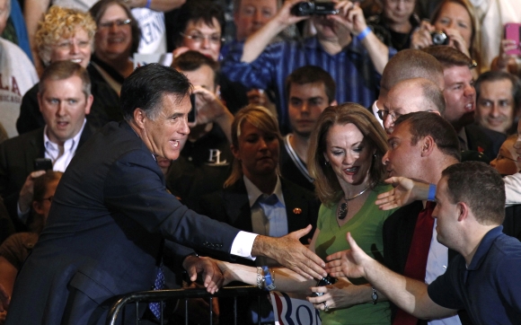 Romney greets supporters during his Illinois primary night rally