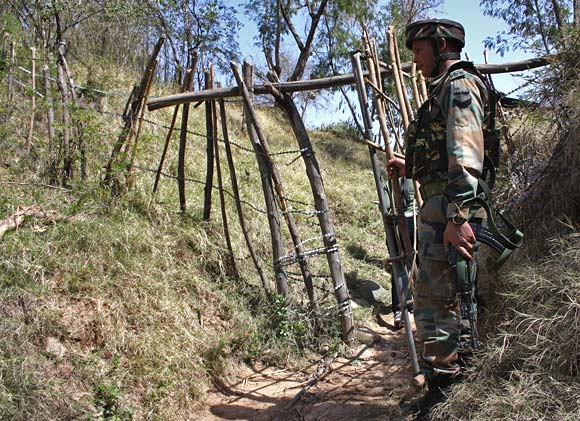 An Indian soldier at a forward post in Jammu and Kashmir