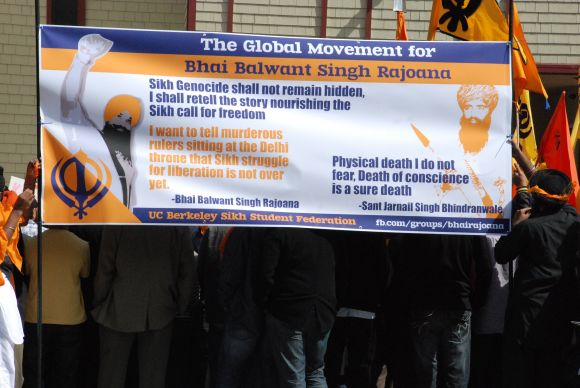 A banner invoking Rajoana's words is seen at the Sikh protest in San Francisco on Friday