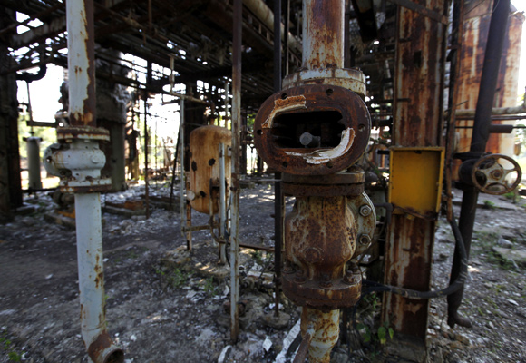 Broken valves are left in the former laboratory of a Union Carbide Corp, now part of Dow Chemical Co, pesticide plant in Bhopal