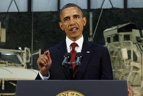 US President Obama delivers an address on US policy and the war in Afghanistan during his visit to Bagram Air Base in Kabul on May 2