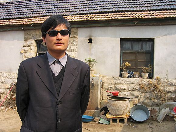 Blind legal activist Chen Guangcheng is seen in this undated handout picture