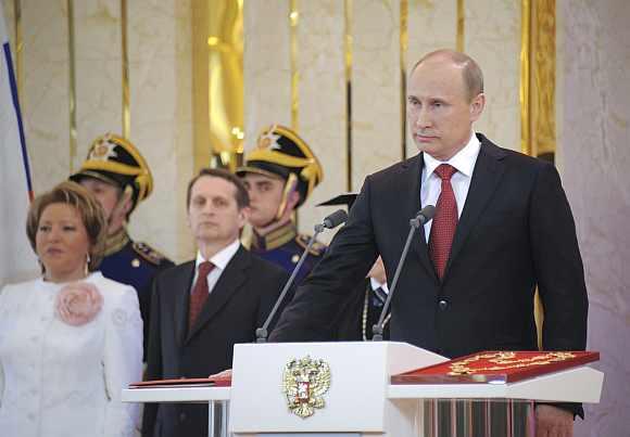 Vladimir Putin is sworn in as the new Russian president during a ceremony at the Kremlin in Moscow, May 7