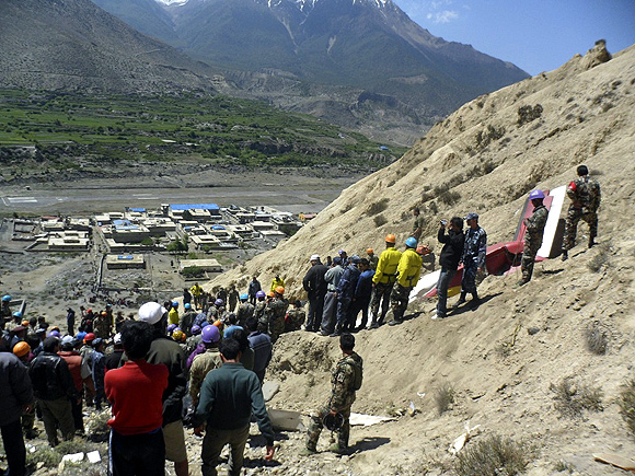 Wreckage of the Dornier aircraft is pictured at the crash site at Jomsom