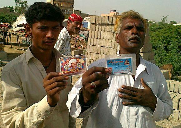 Pakistani Hindus flashing their ID cards