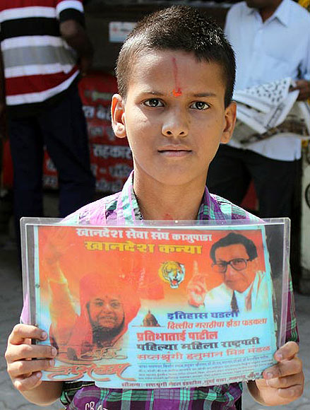 A supporter of Thackeray outisde his Bandra home
