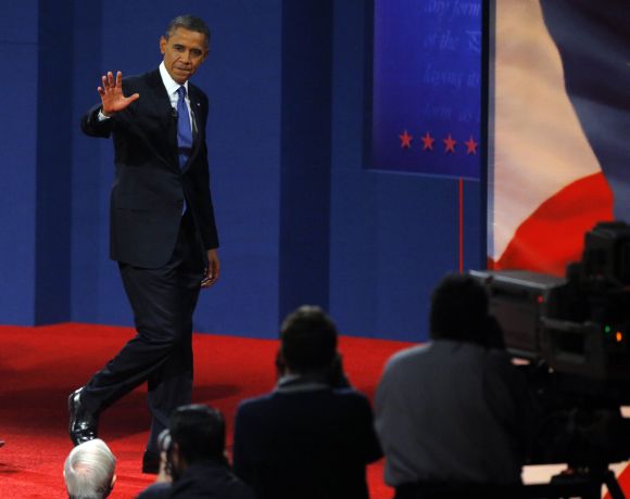 U.S. President Barack Obama walks offstage after the first presidential debate in Denver