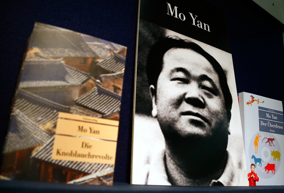 Books of Chinese writer Mo Yan are on display during a book fair