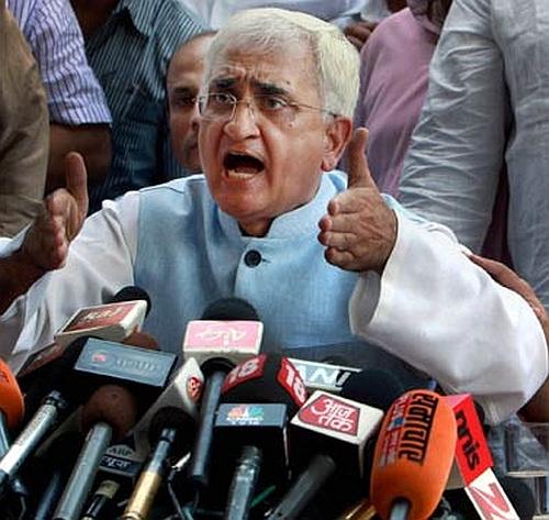 Law Minister Salman Khurshid at the press conference in New Delhi