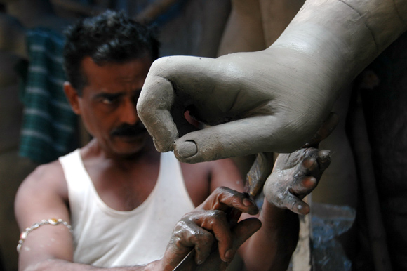 An artisan at work in Kumortuli