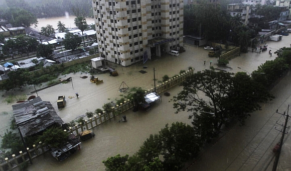 A street is seen submerged by flood water in Chittagong