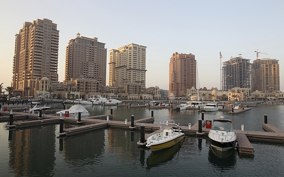 Yachts are parked at the Pearl-Qatar harbour in Doha, Qatar