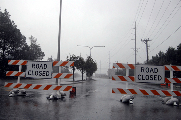 Signs mark road closures as Hurricane Sandy bears down on Dewey Beach, Delaware
