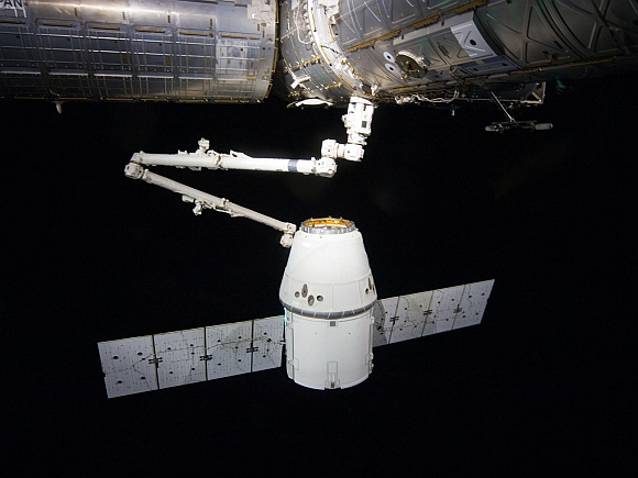 The SpaceX Dragon cargo craft is pictured just prior to being released by the International Space Station's Canadarm2 robotic arm to allow it to head toward a splashdown in the Pacific Ocean