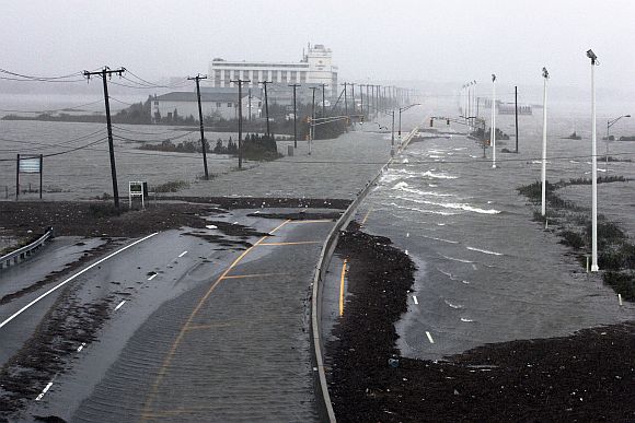 US Route 30, the White Horse Pike, one of three major approaches to Atlantic City, New Jersey, is covered with water from Absecon Bay in this view looking west, during the approach of Hurricane Sandy