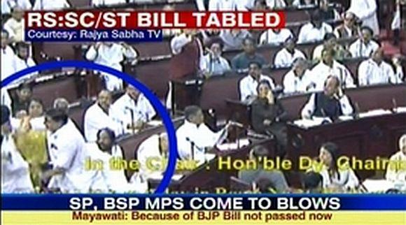 Video grab of the brawl in Rajya Sabha