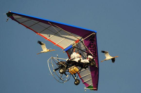 Russian President Vladimir Putin flies in a motorized deltaplane at Yamalo-Nenets district on Wednesday.