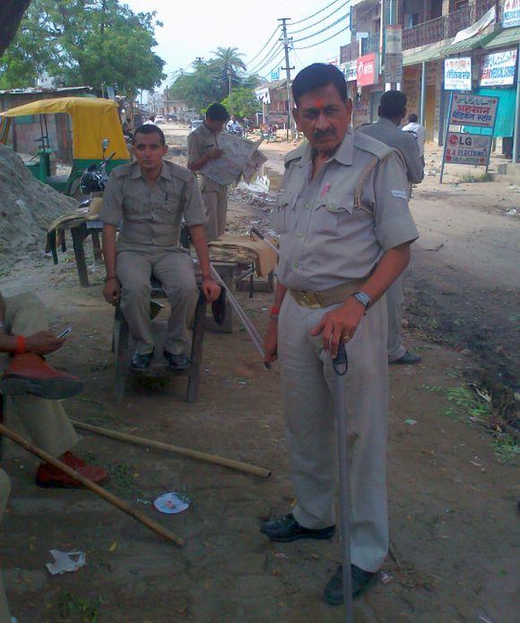 Policemen keep a close watch in riot-hit Masuri