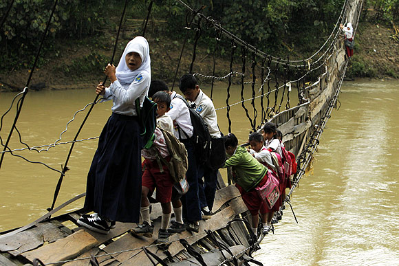 IN PHOTOS: Getting to school at ALL COSTS