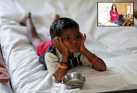 A malnourished child waits for food at the Nutritional Rehabilitation Centre in Sheopur district in Madhya Pradesh. (Inset) Dr Purnima Menon