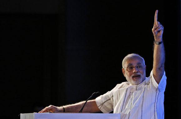 Gujarat's Chief Minister Narendra Modi speaks during the 29th annual session of Federation of Indian Chambers of Commerce and Industry (FICCI) Ladies Organisation in New Delhi