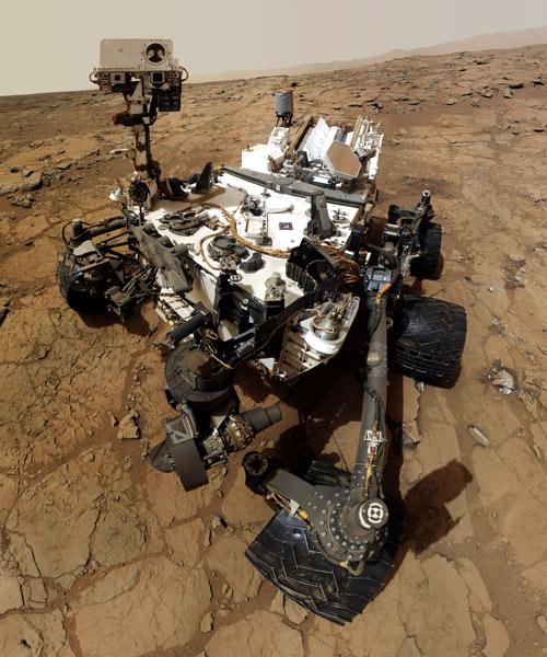 NASA's Mars rover Curiosity's self-portrait. The image was made by combining dozens of exposures taken by the rover's Mars Hand Lens Imager (MAHLI). The rover is positioned at a patch of flat outcrop called John Klein, which was selected as the site for the first rock-drilling activities by Curiosity.