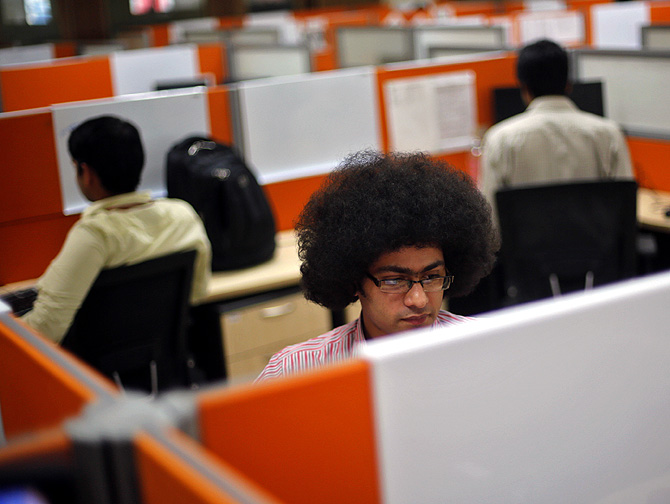 Employees at the Tech Mahindra office in Noida.