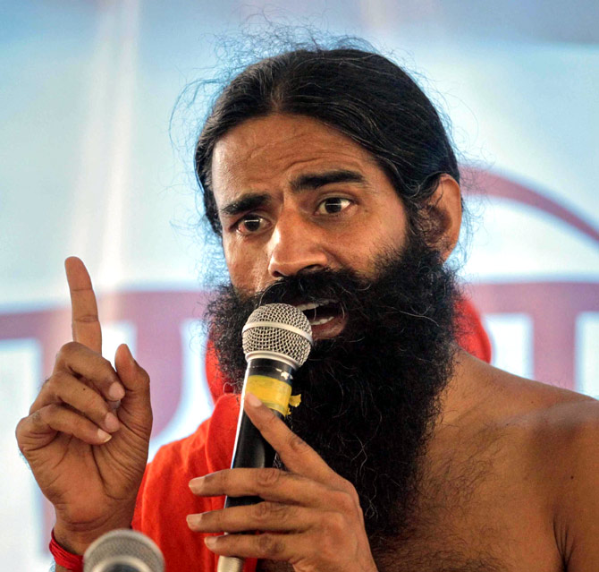 India's yoga guru Swami Ramdev addresses his supporters during his fast against corruption in the northern Indian town of Haridwar